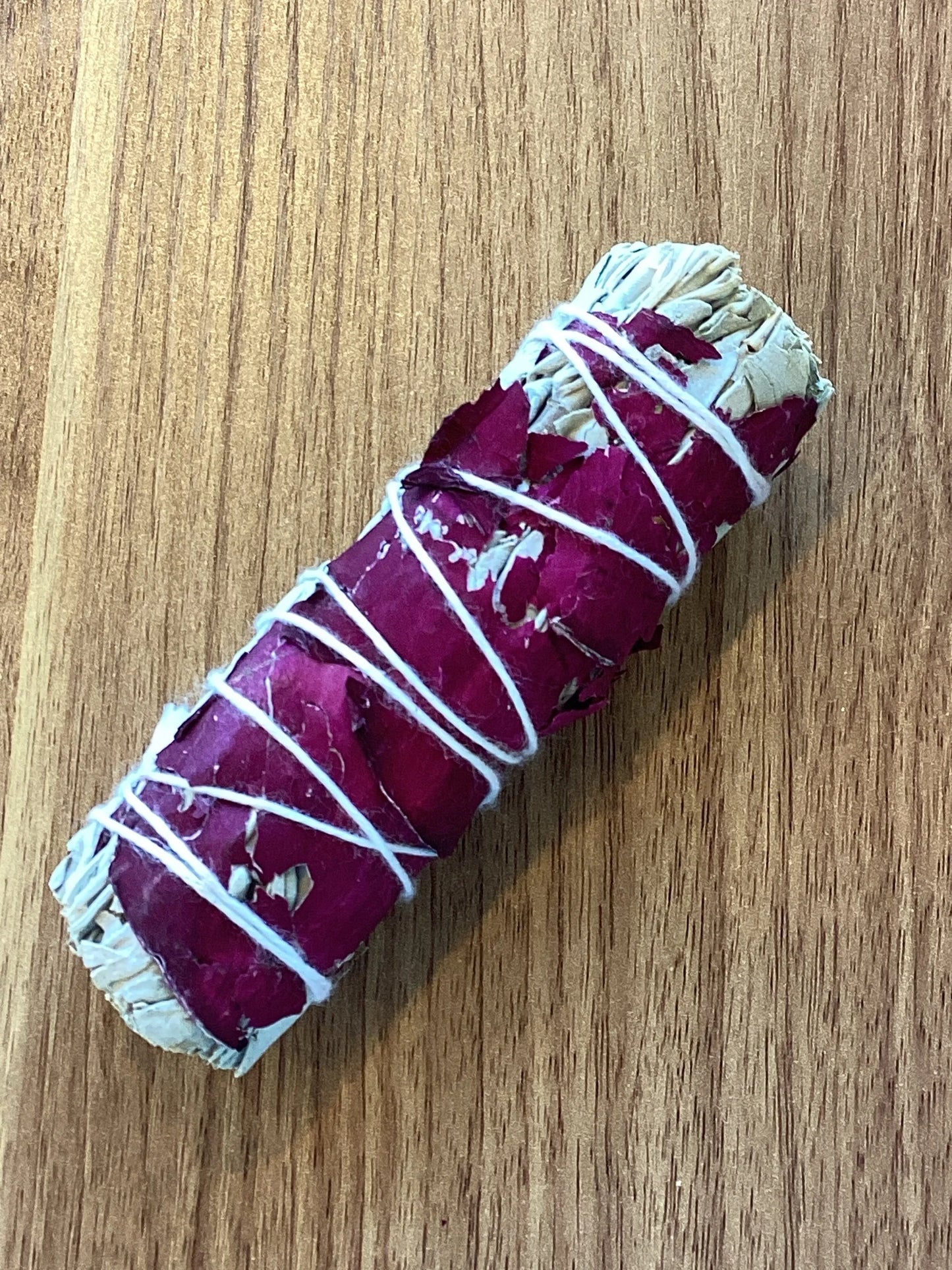 Sage bundle with rose petals